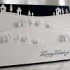 photo of pop up holiday card with trees and snow