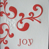 photo of holiday card with joy Letterpress type